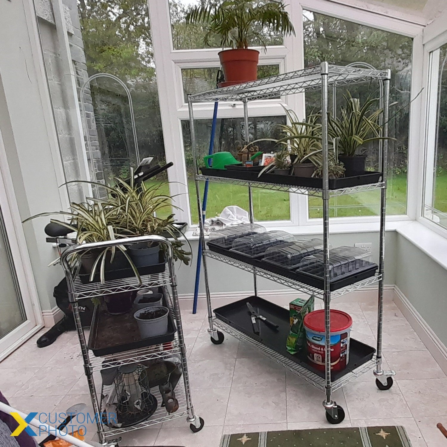 4-tier mobile chrome shelving unit in use