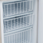 Removable wire baskets inside a freezer cabinet in the Blizzard UCFFST280 stacked arrangement